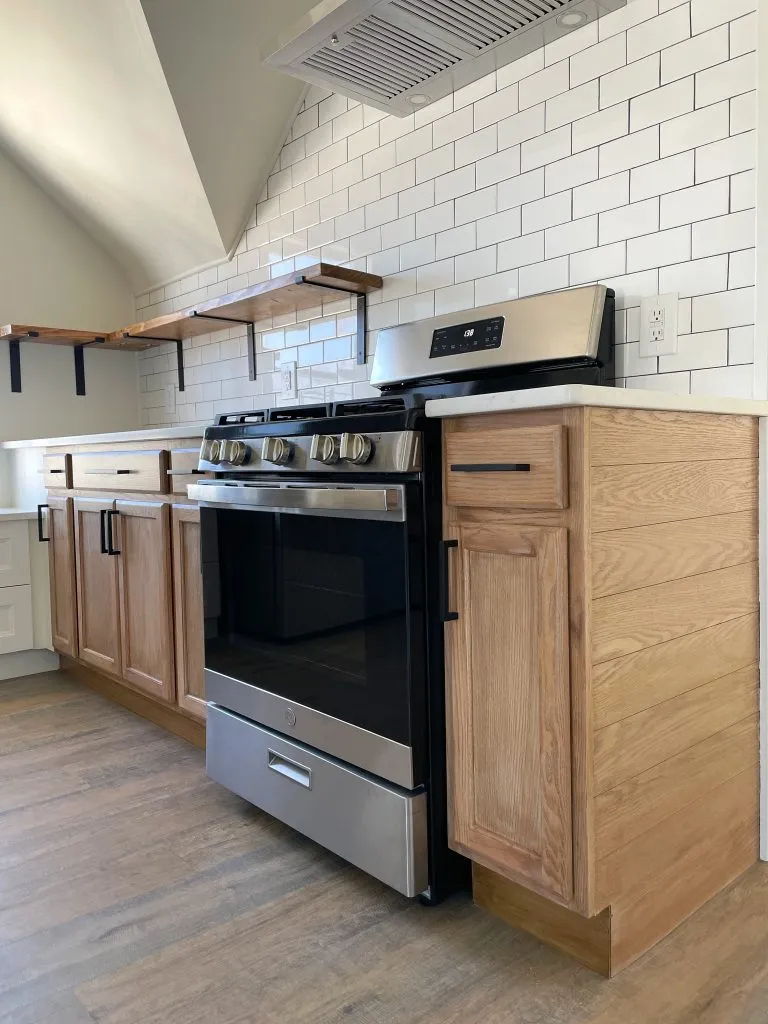 Modern white painted cabinets by Wilson's Painting